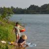 Hue women do their laundry at the Perfume River.
